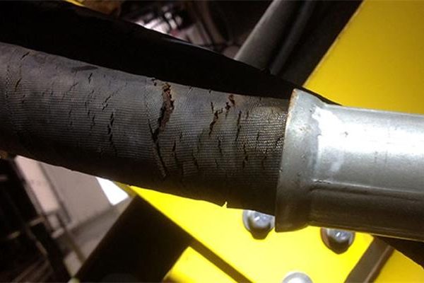 Broken hydraulic hoses Topa